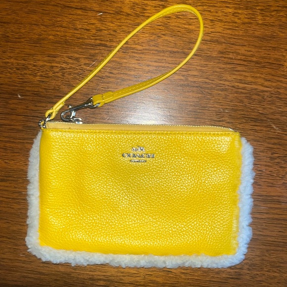 Coach Handbags - COPY - Coach Shearling Faux Fur POM POM Trim Yellow Wristlet